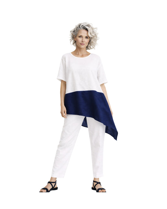 Jen Kahn blocked linen top in indigo and white worn on model with short sleeves and asymmetric hem