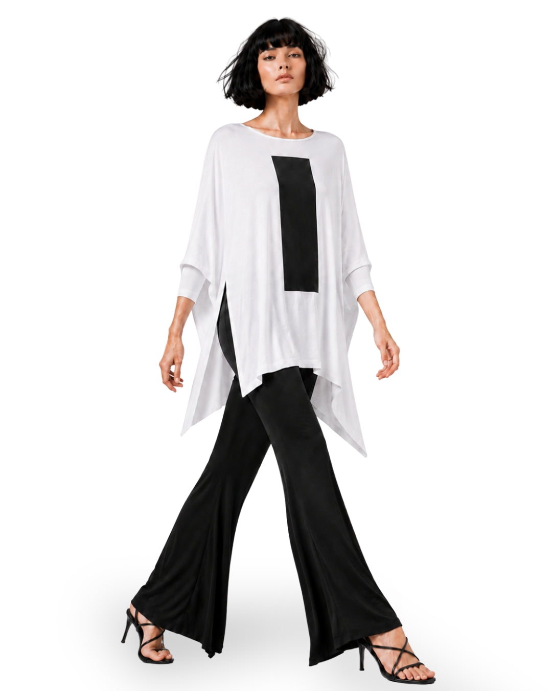 jen kahn Column Jersey Knit Top in White with black column print, styled with black flared jersey pants.