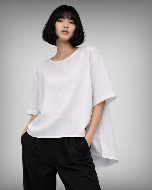 Model wearing the jen kahn Tokyo Top in pure breathable linen.