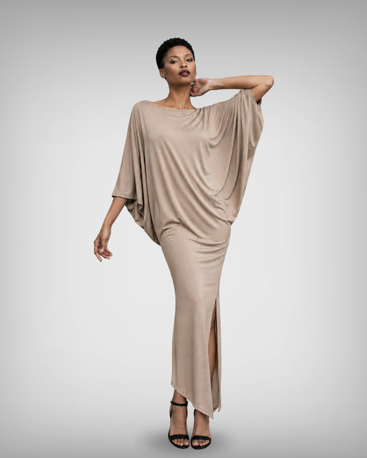 Jen Kahn Batwing Dress in Stone jersey knit with a fluid draped upper body, streamlined lower shape, asymmetric hem and front slit.
