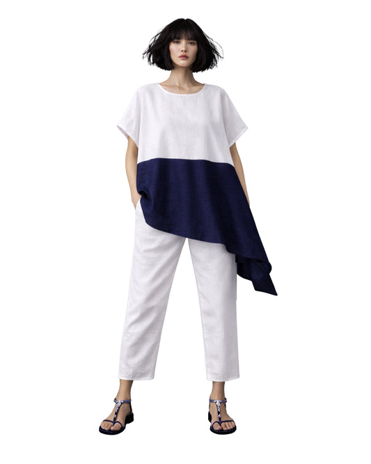 Jen Kahn blocked linen top in indigo and white with short sleeves and asymmetric hem worn on model