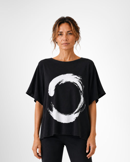 jen kahn Brushed Zen Print Jersey Knit Top in Black with a bold White circular Zen print, relaxed fit, round neckline and short sleeves.