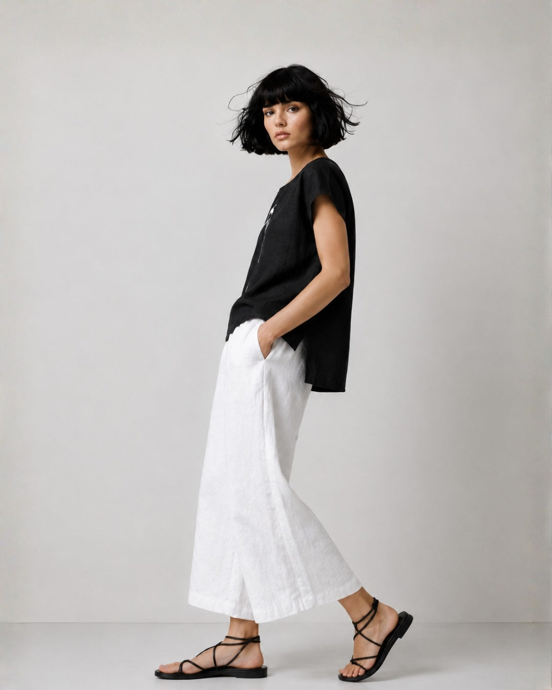 jen kahn Cave Print Linen Top shown from the side on model, highlighting the relaxed boxy shape and natural drape of the pure linen.