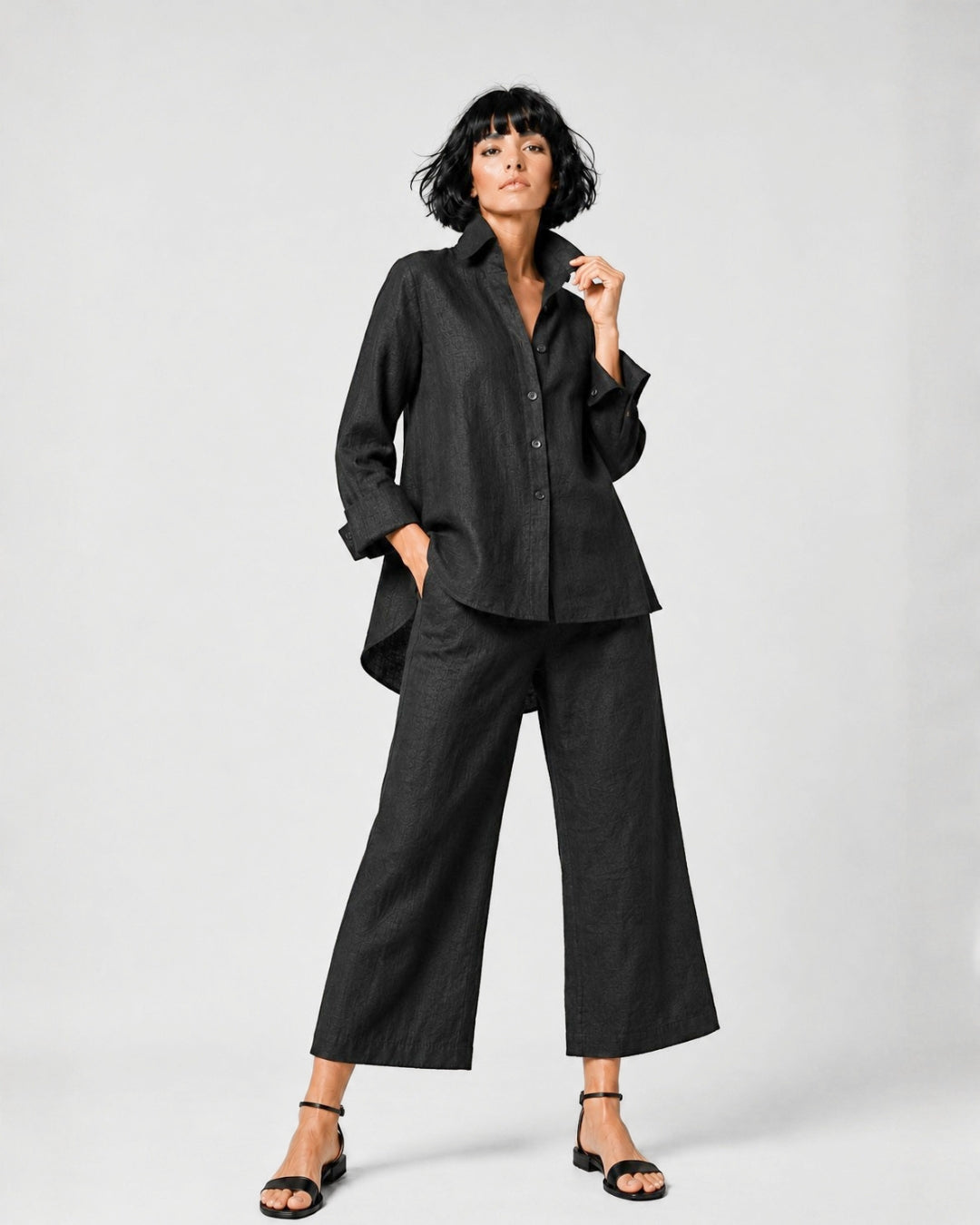 Jen Kahn Flared Linen Shirt in Black pure linen with a fitted bust, elegant flare, button-through front and longer rounded back hem.