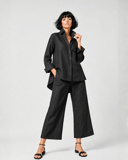 Jen Kahn Flared Linen Shirt in Black pure linen with a fitted bust, elegant flare, button-through front and longer rounded back hem.
