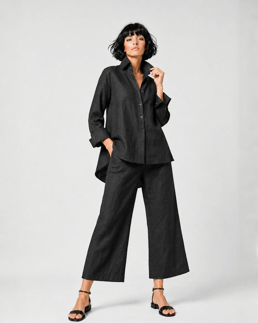 Jen Kahn Flared Linen Shirt in Black pure linen with a fitted bust, elegant flare, button-through front and longer rounded back hem.