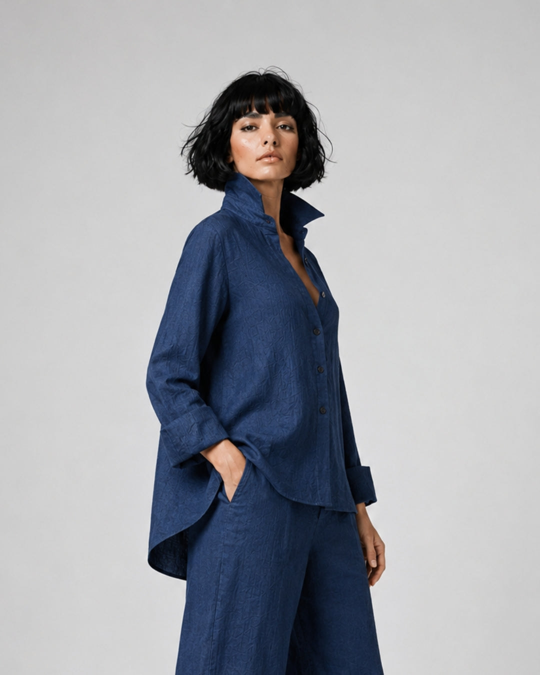 Jen Kahn Flared Linen Shirt in Indigo pure linen with a fitted bust, flared shape, button-through front and longer rounded back hem.