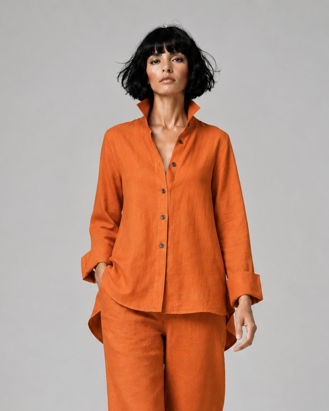 Jen Kahn Flared Linen Shirt in Tangerine pure linen with a fitted bust, flared shape, button-through front and longer rounded back hem.