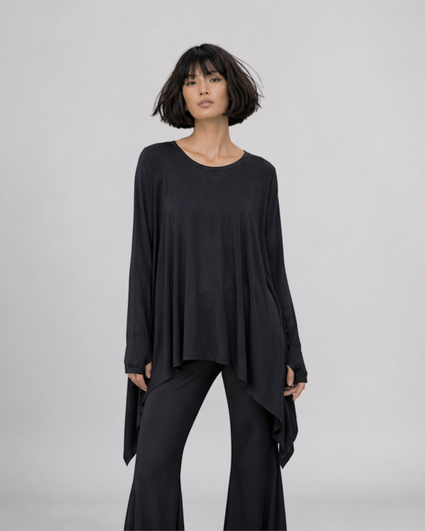 jen kahn Jersey Knit Mitten Top in Black with long integrated mitten sleeves, a relaxed fluid fit and asymmetric pointed hem.