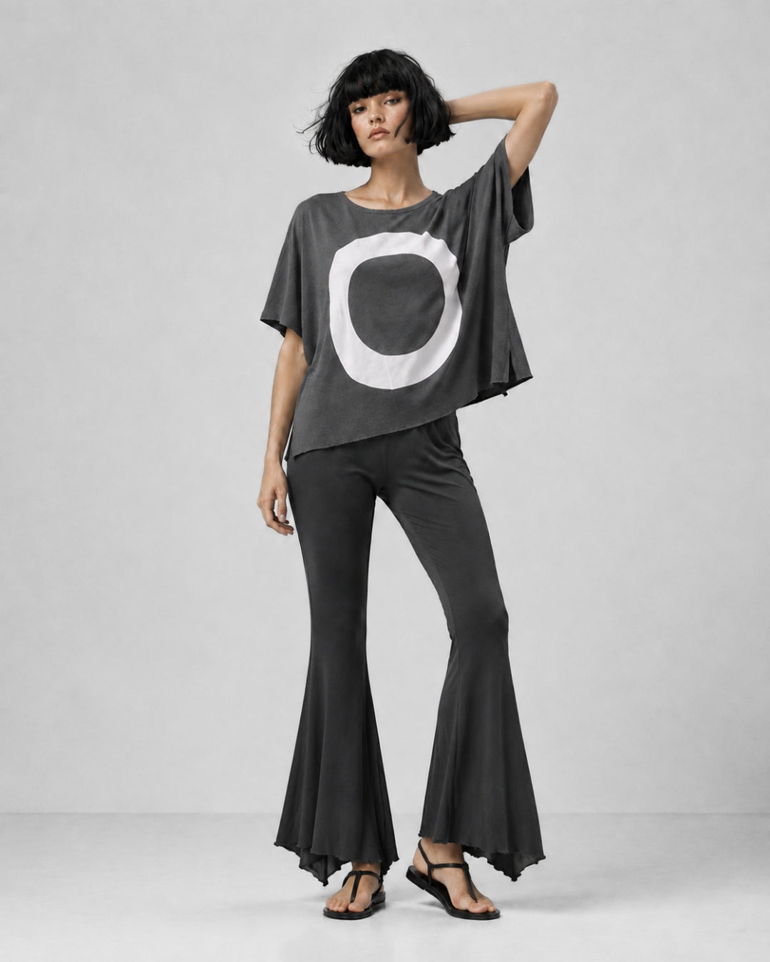 jen kahn Jersey Knit Pointed Pants in Anthracite with a fluid flared leg and distinctive pointed hem, shown on model with the anthracite Zen jersey top