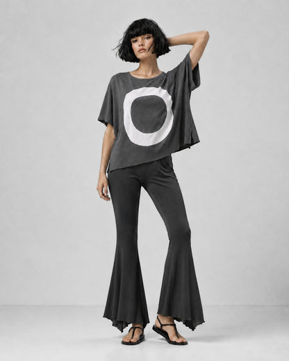 jen kahn Jersey Knit Pointed Pants in Anthracite with a fluid flared leg and distinctive pointed hem, shown on model with the anthracite Zen jersey top