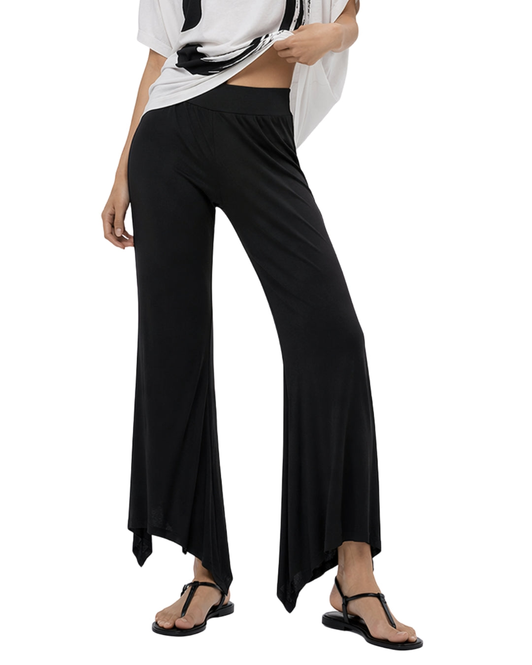 jen kahn Jersey Knit Pointed Pants in Black, shown from waist to feet with a softly flared leg and asymmetric pointed hem.