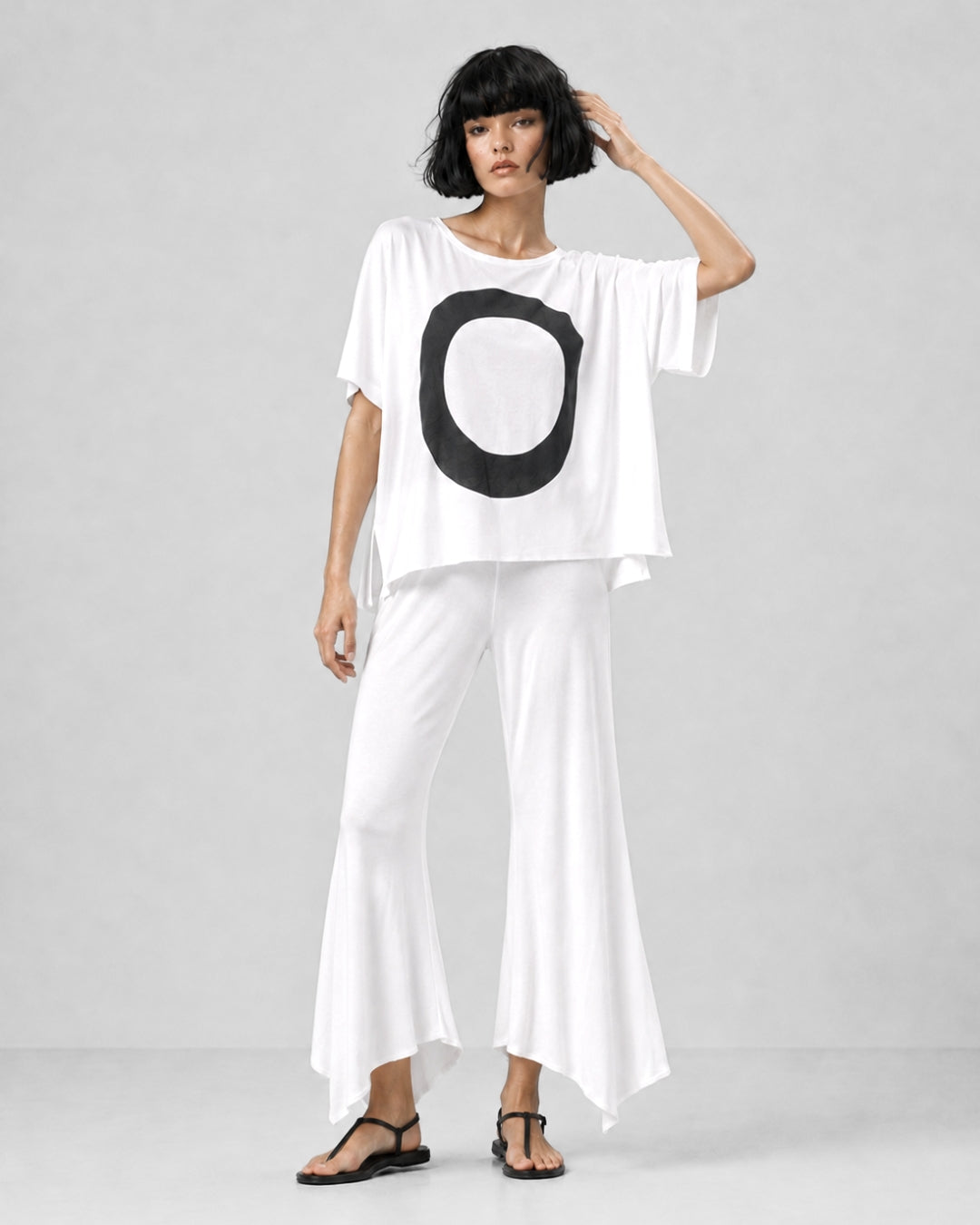 jen kahn Jersey Knit Pointed Pants in White with a fitted upper leg, fluid flare and distinctive pointed hem, styled with the Zen Jersey Knit Top.