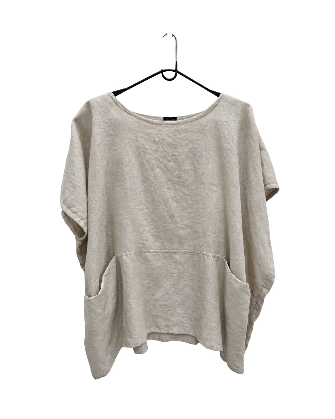 Front view of the jen kahn Linen Pocket Top in Natural on a hanger, showing the round neckline, short sleeves and seam-set front pockets.