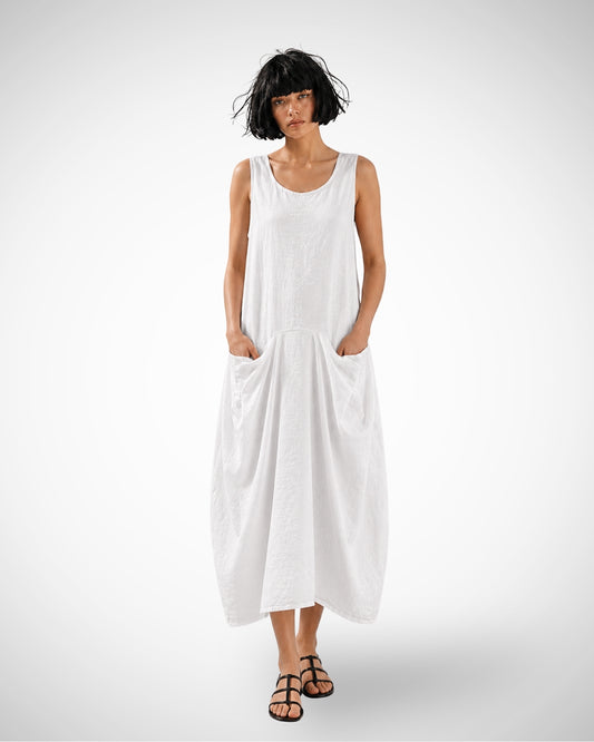 Jen Kahn Linen Sailing Dress in white pure linen with a sleeveless silhouette and distinctive inward-draped front pockets.