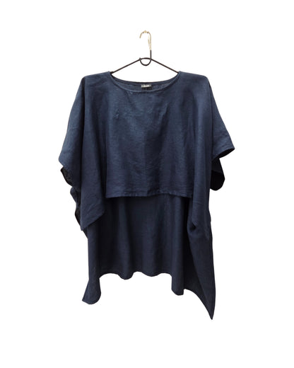 Jen Kahn long Tokyo linen tunic on a hanger with  short sleeves, hidden seam pockets and longer back hem in eclipse .