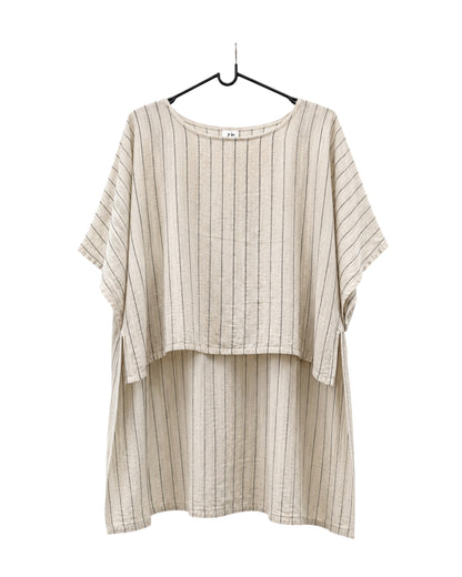 Jen Kahn long Tokyo linen tunic on a hanger with  short sleeves, hidden seam pockets and longer back hem in natural with black pinstripe.
