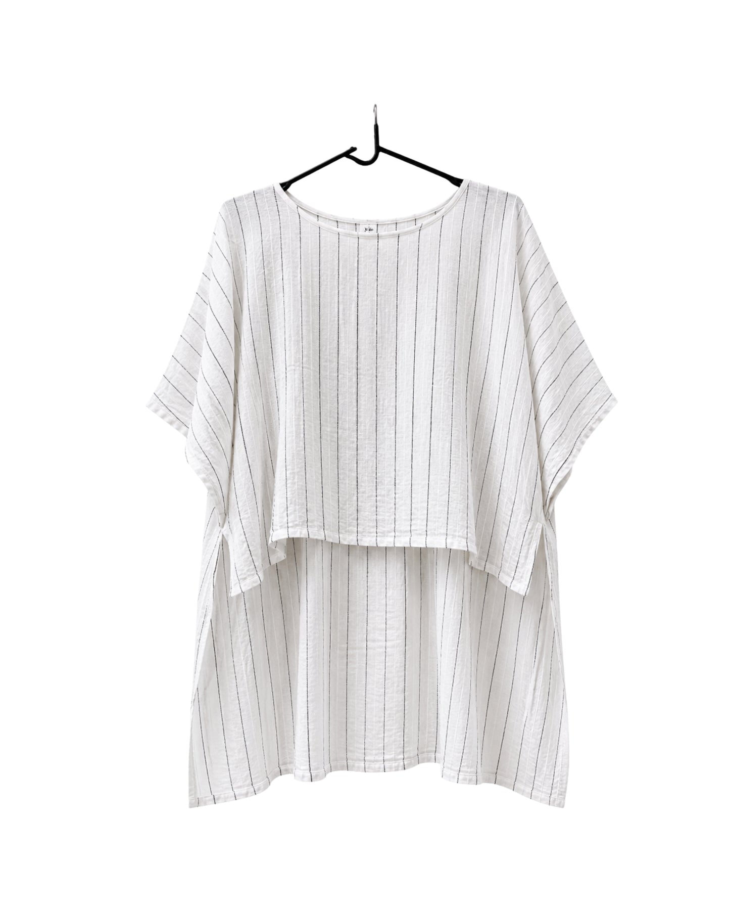Jen Kahn long Tokyo linen tunic on a hanger with  short sleeves, hidden seam pockets and longer back hem in white with black pinstripe