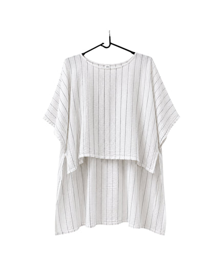 Jen Kahn long Tokyo linen tunic on a hanger with  short sleeves, hidden seam pockets and longer back hem in white with black pinstripe