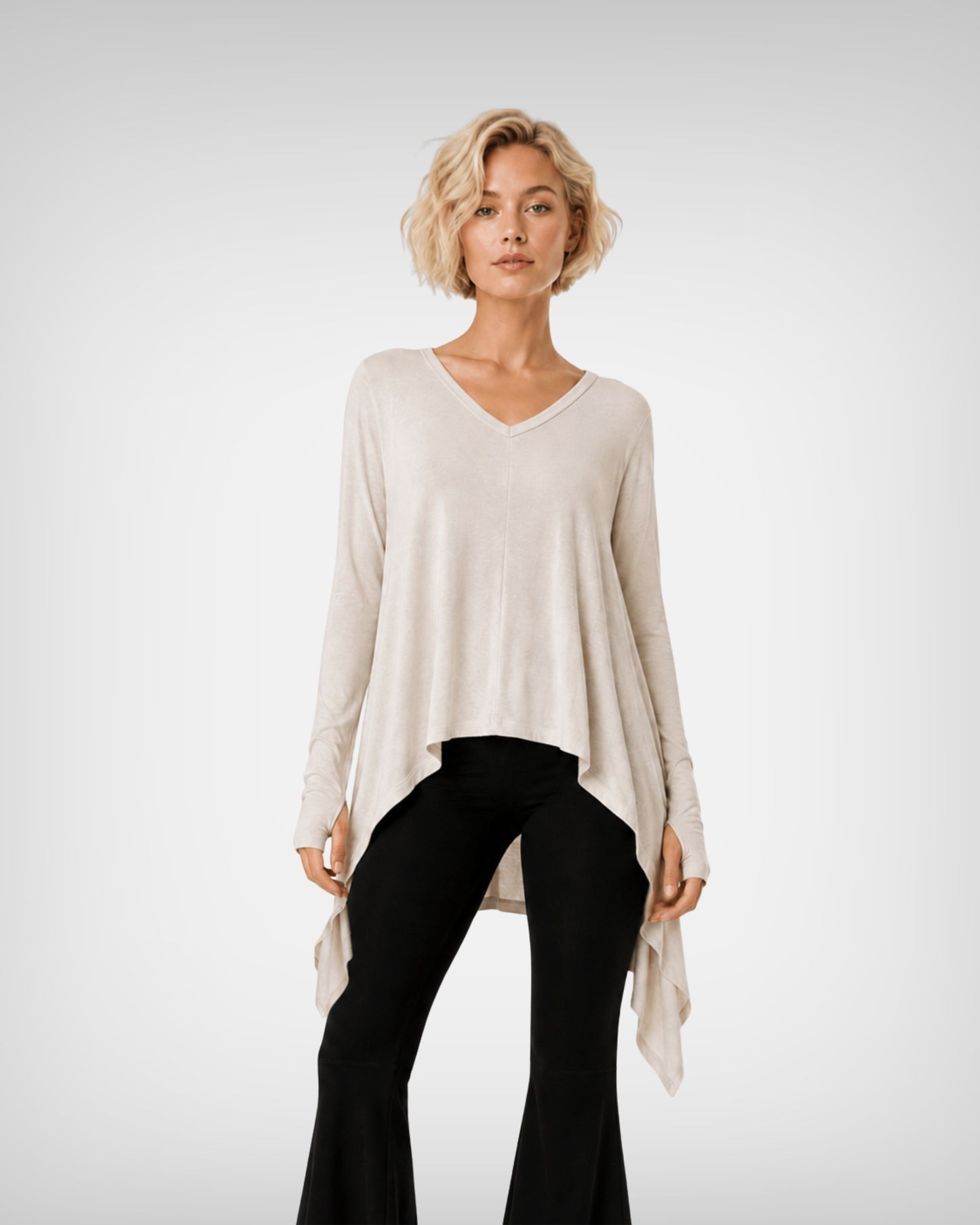 jen kahn Pointed Jersey Top in Stone crafted from luxurious imported jersey knit with a V-neck, built-in mittens and an asymmetric draped hem.