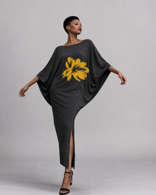 Jen Kahn printed batwing jersey dress in black with saffron floral print worn on model