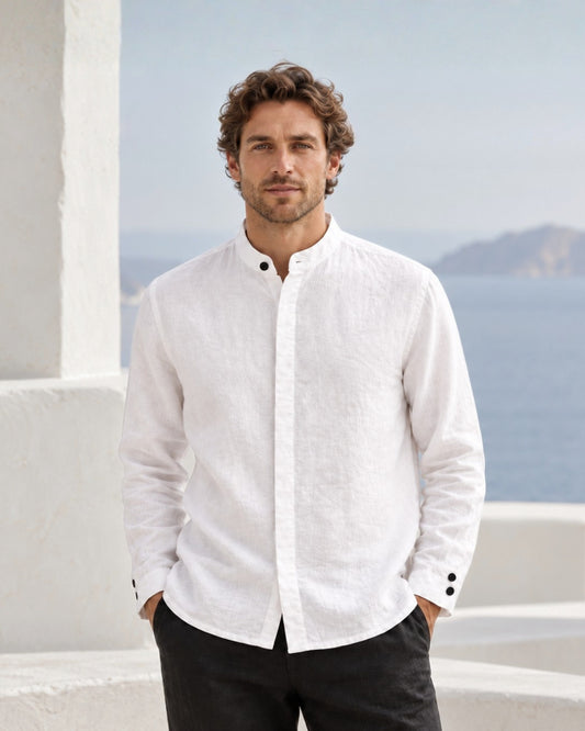 Jen Kahn Roman Linen Shirt in white pure linen with a stand collar, concealed front placket and black button detailing.