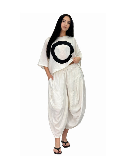 Jen Kahn white samurai linen pants with dropped crotch and wide leg worn on model