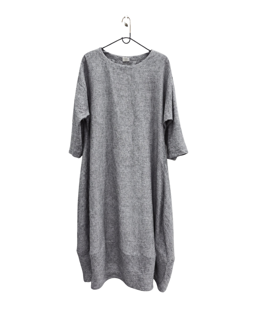 Jen Kahn Tokyo linen dress in grey mélange on a hanger, with a textured weave and relaxed cocoon shape.