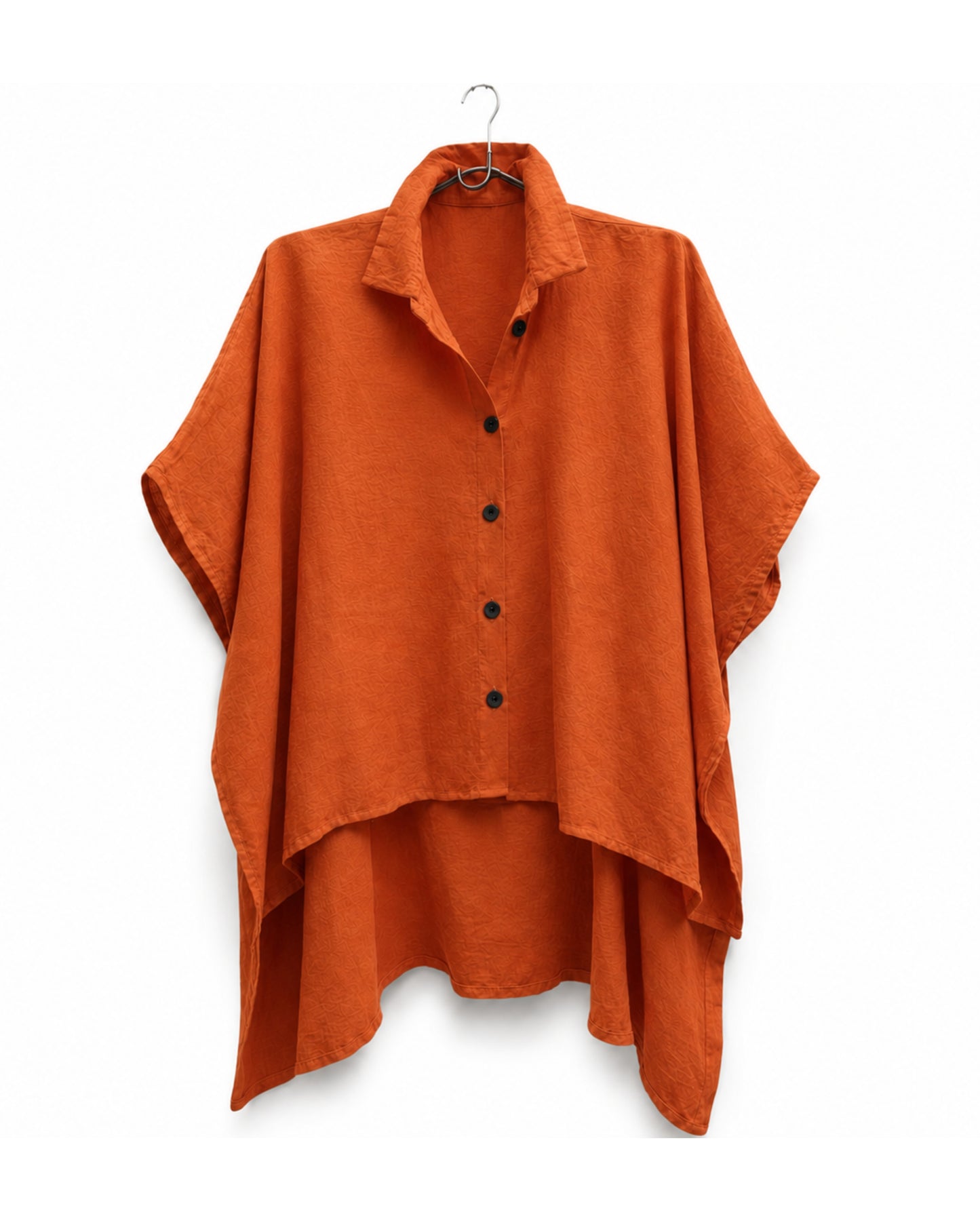 jen kahn Tokyo Linen Shirt in Tangerine made from pure linen with a classic shirt collar, relaxed box-cut silhouette, high-low hem and deep side slits.