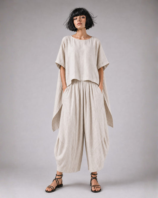 jen kahn Tokyo Linen Top in natural linen worn with Samurai Trousers and the Assegai Pendant. 