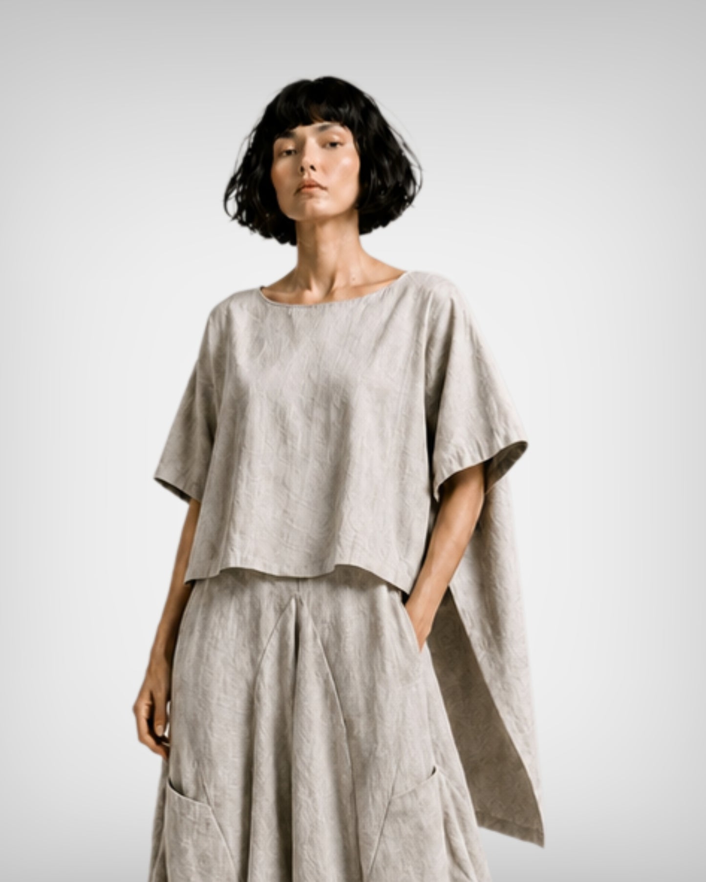 jen kahn Tokyo Linen Top in natural crafted from pure linen with a relaxed fit and asymmetric high-low hem.