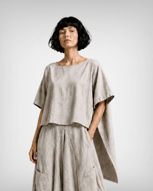 jen kahn Tokyo Linen Top in natural crafted from pure linen with a relaxed fit and asymmetric high-low hem.