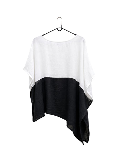 The jen kahn Blocked Linen Top in black and white pure linen displayed on a hanger.