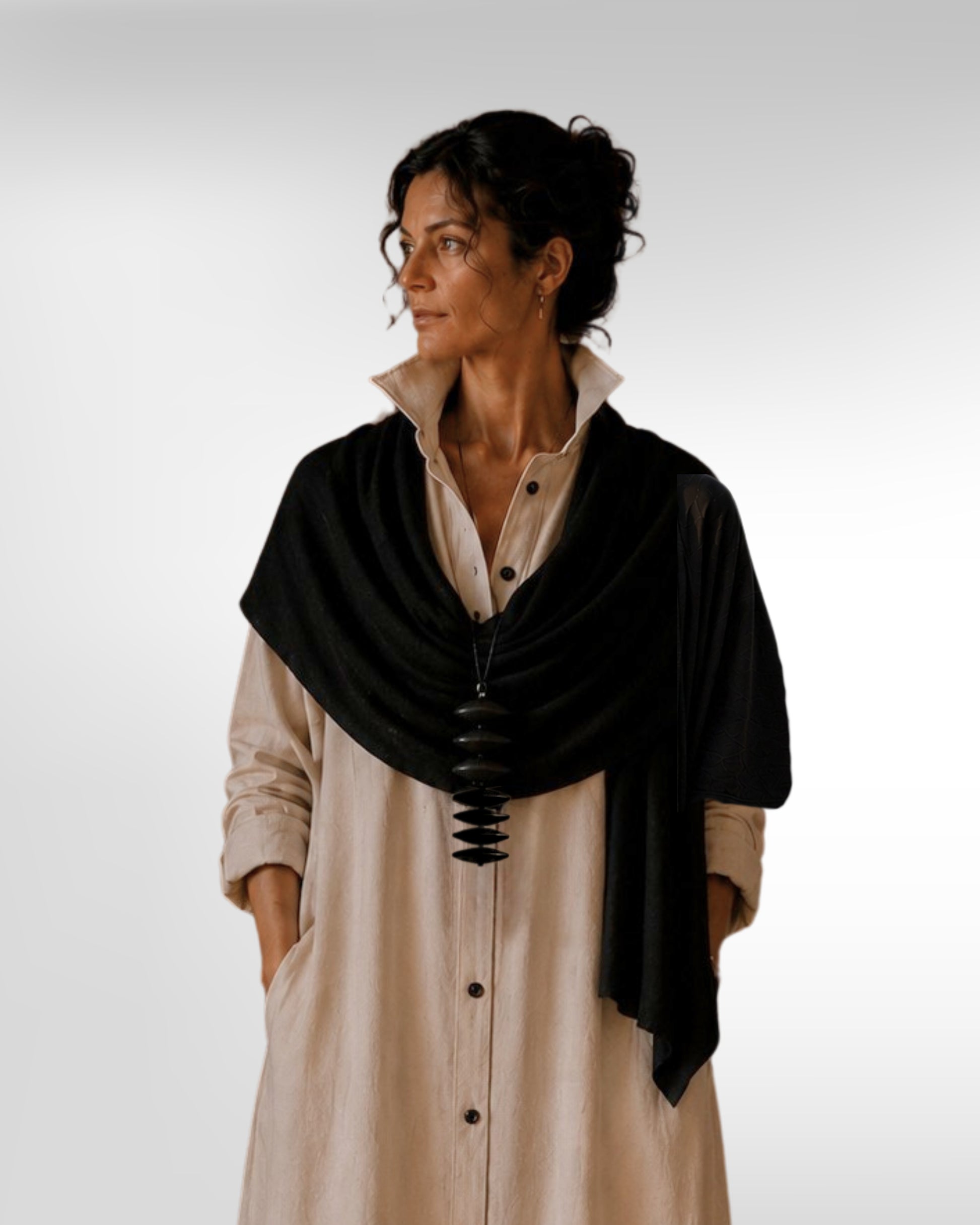 Model wearing the black jen kahn Kimono Wrap in a soft wool blend with a draped silhouette and relaxed fit.